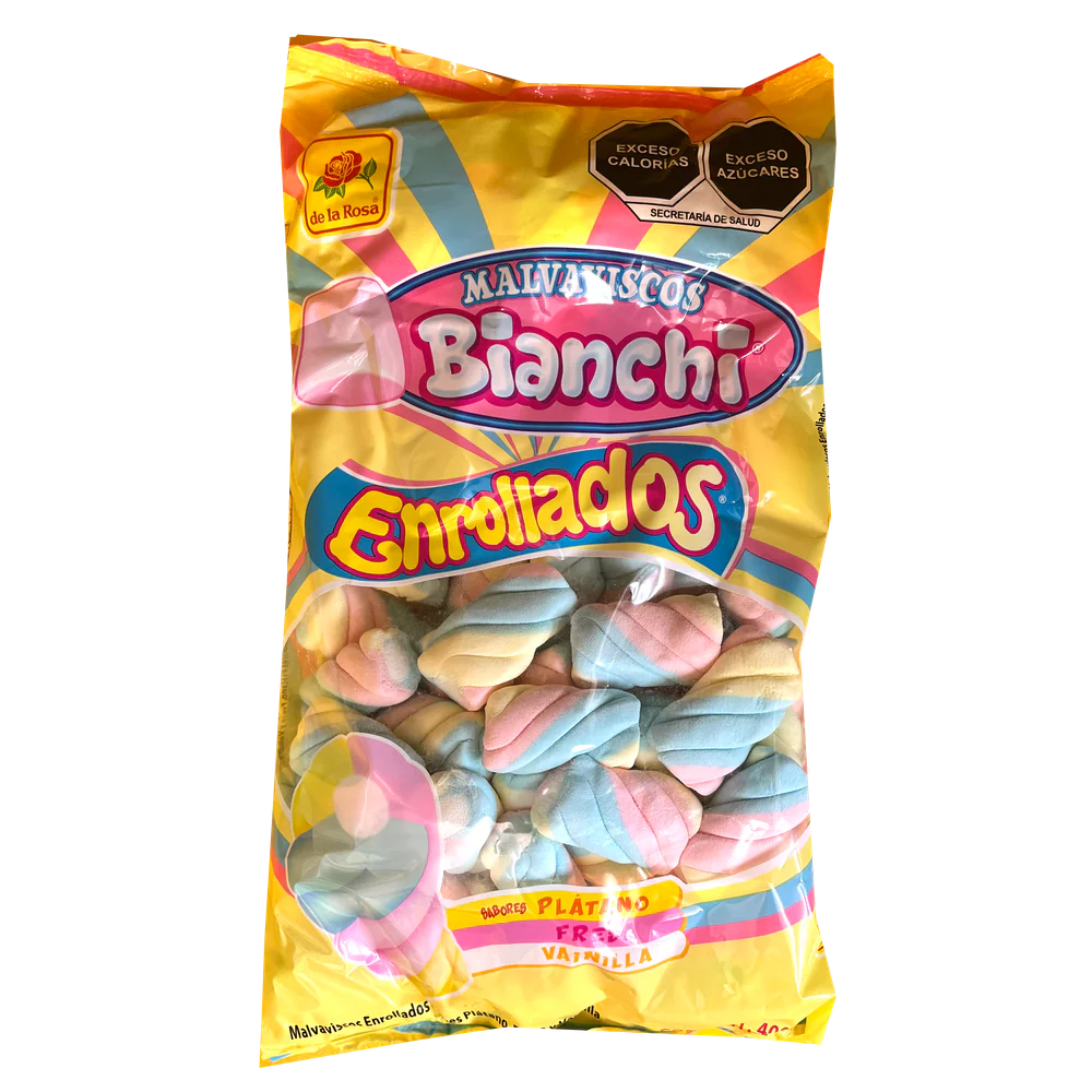 Imagen de productos De La Rosa, como dulces tradicionales mexicanos, incluyendo opciones como mazapanes, pulpas, caramelos, gomitas, malvaviscos, paletas, bombones y chocolates, en diversas presentaciones individuales o en bolsa, con empaques coloridos característicos de la marca.